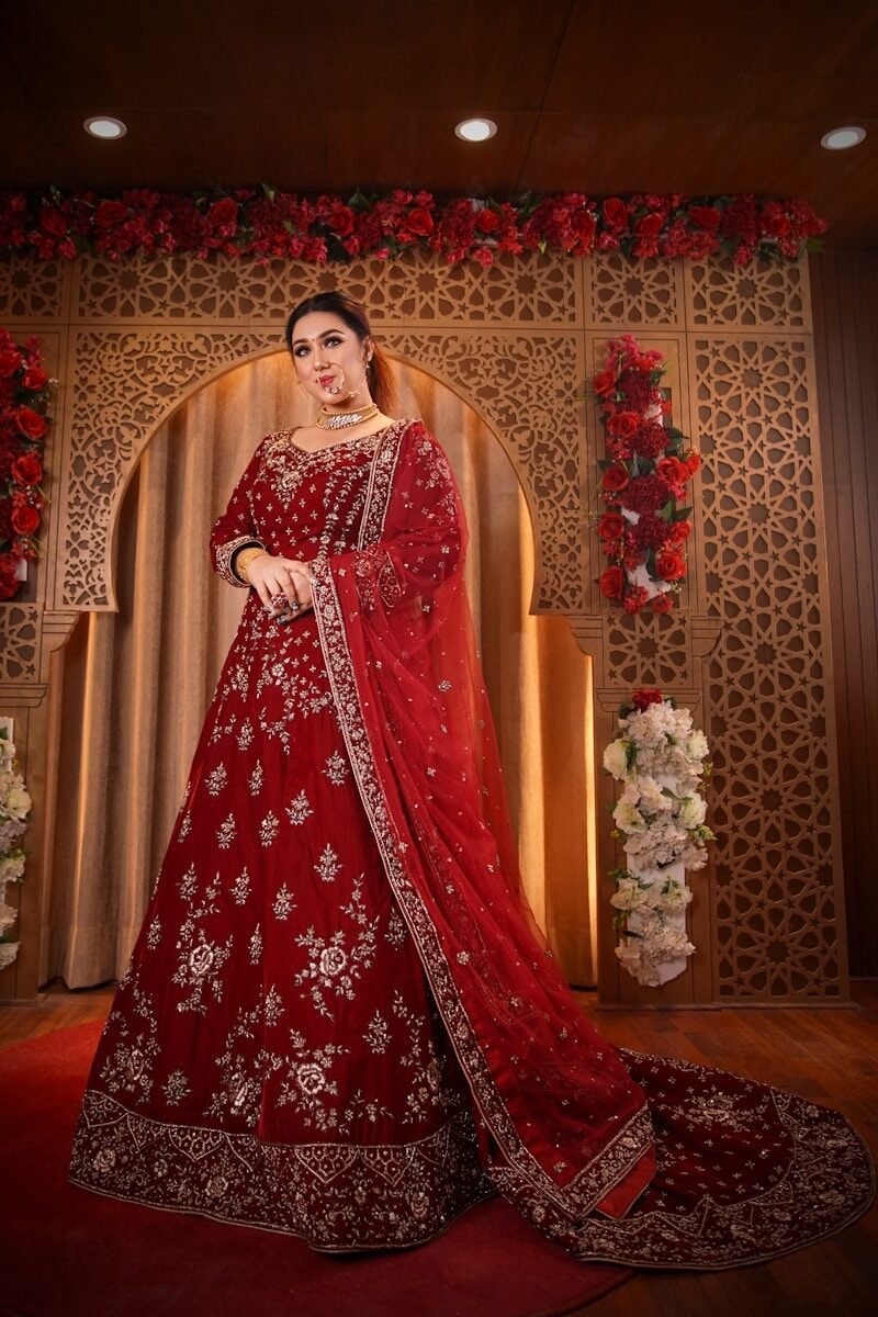 woman in red and white floral dress